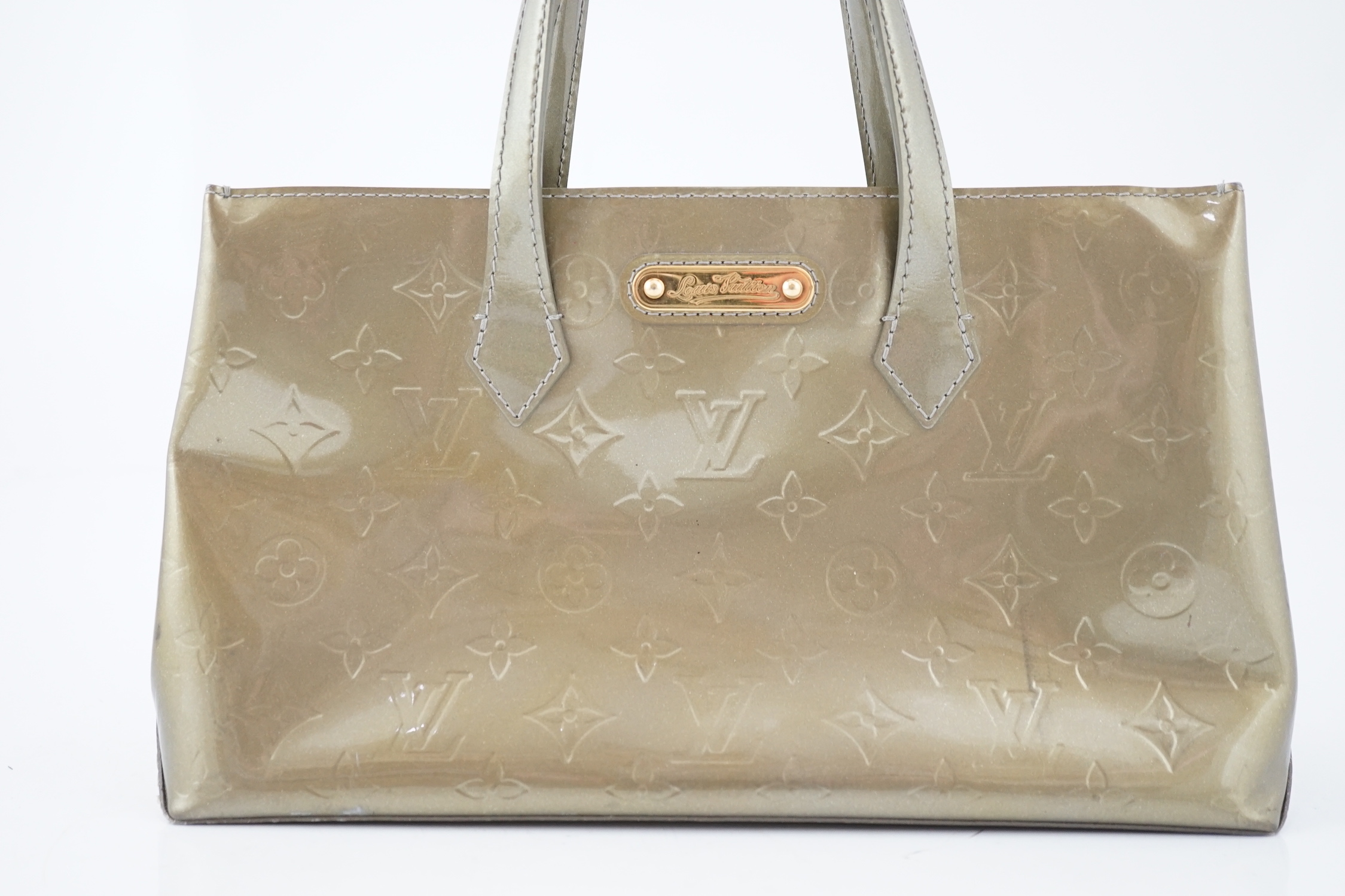 A Louis Vuitton gold metallic monogram tote bag, height 18cm, height to handle 29cm, width 31cm, depth 11.5cm